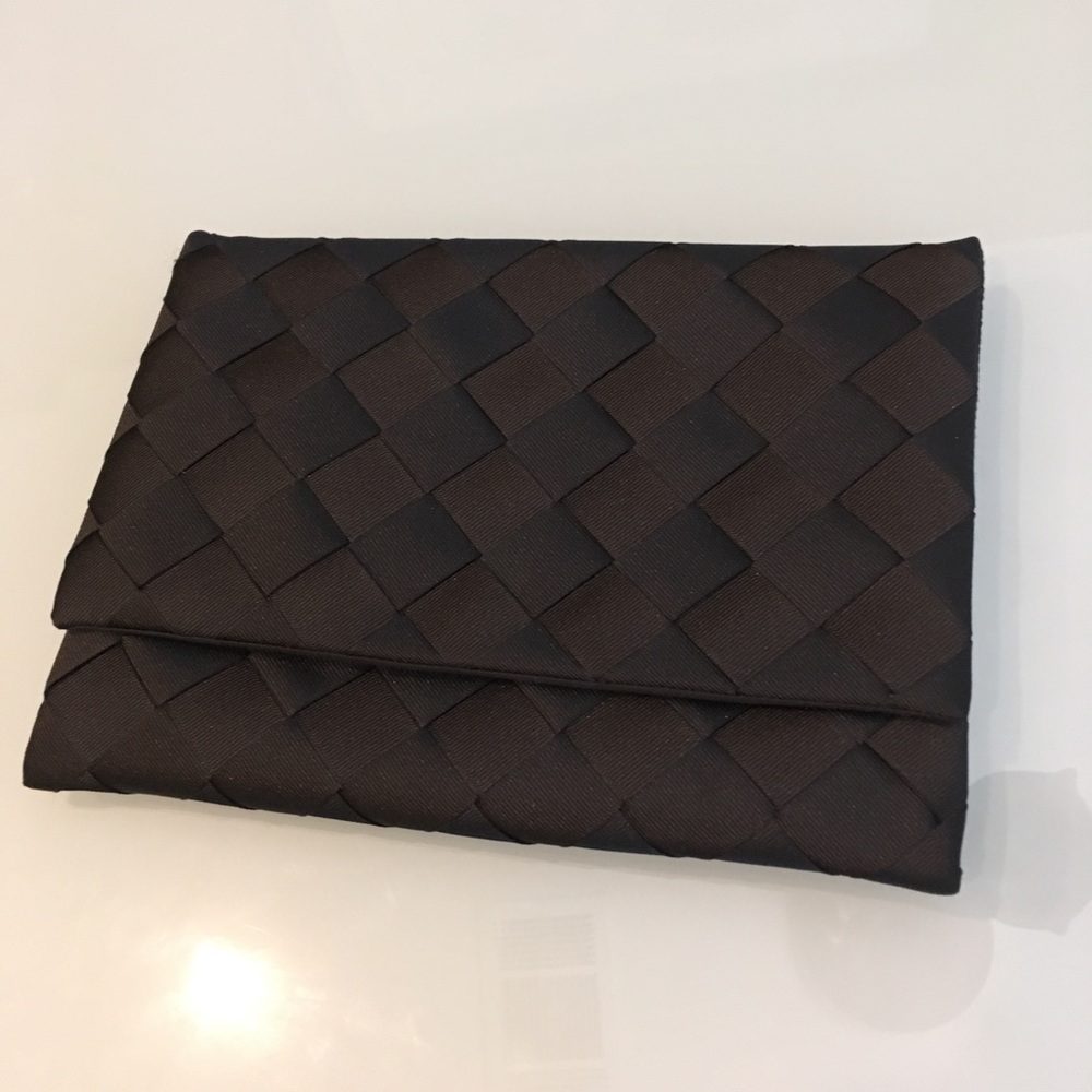 Black purse in woven fabric